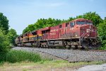 CP 8859 leads a grain train north at Lassiter Road 